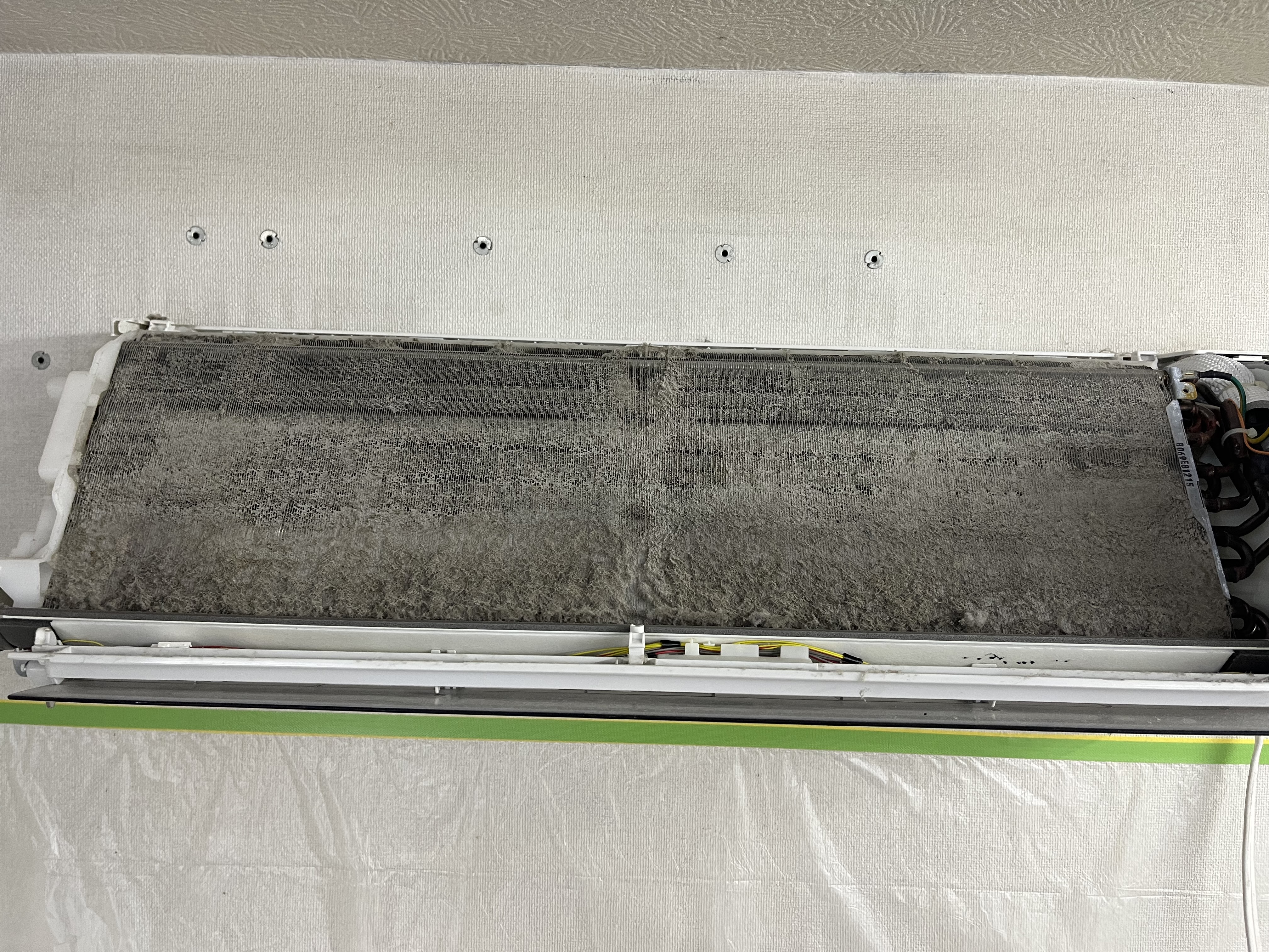 京都府向日市寺田町修理式のお掃除機能付きエアコンの作業前1